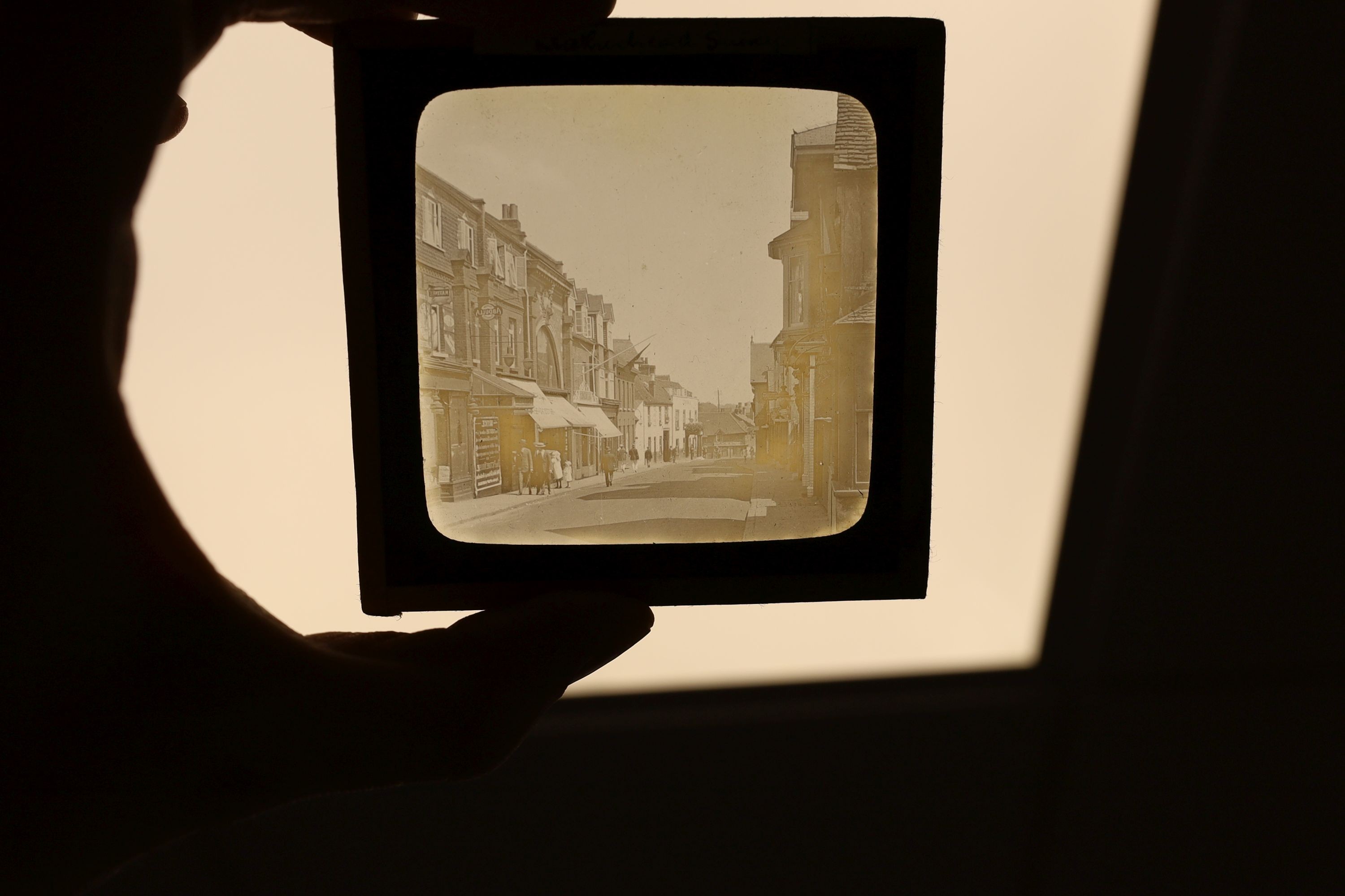 A late 19th century Magic lantern, cased with slides